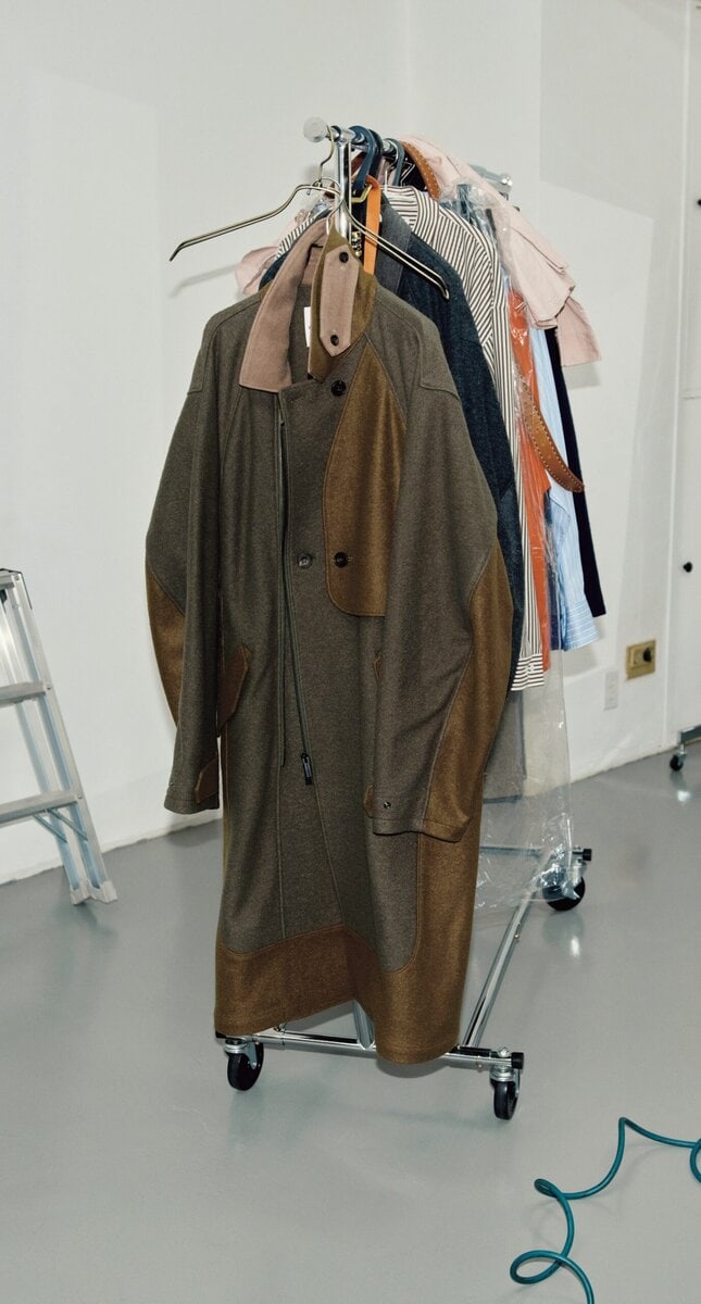 ホワイトマウンテニアリングのバルマカーンコート