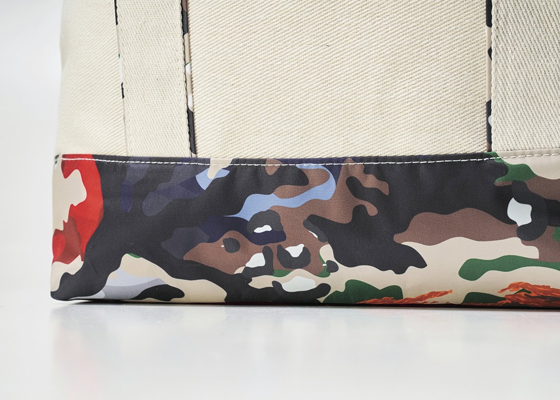ハンドルと底の部分に新作HYBRID CAMOパターンを採用