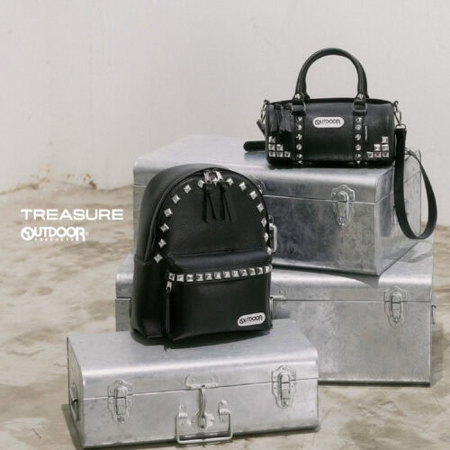 OUTDOOR PRODUCTS（アウトドアプロダクツ）が、グローバルボーイズグループTREASURE（トレジャー）との初コラボレーションを発表。デイパックとロールボストンをベースにした全6型のバッグコレクションを、2026年8月20日よりYGEX OFFICIAL SHOPおよびTREASURE Weverse Shopで発売する。